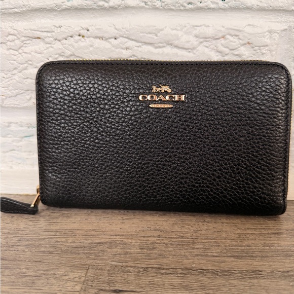 Coach Handbags - Coach Black Pebbled Leather Zip Clutch with Gold Logo